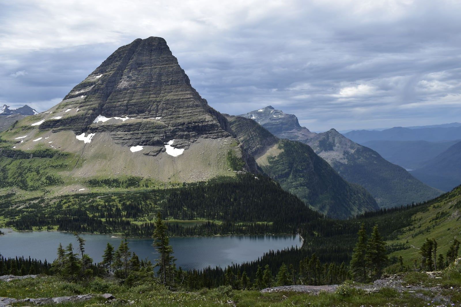 Bearhat Mountain stands above the waters of Hidden Lake in Glacier National Park.
